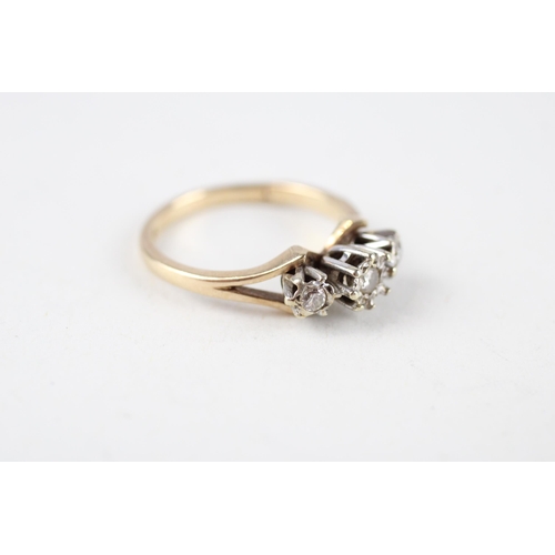 83 - 9ct gold diamond three stone ring (2.6g) Size  M