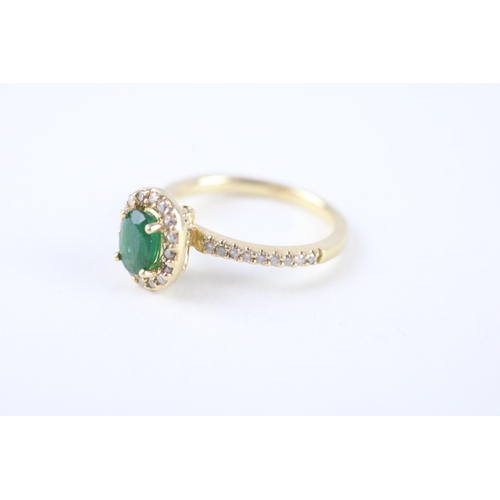 85 - 14ct gold emerald & diamond halo ring (4.2g) Size  N