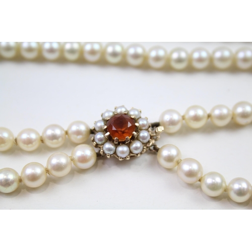 96 - 9ct gold cirtine & cultured pearl necklace (50.6g)