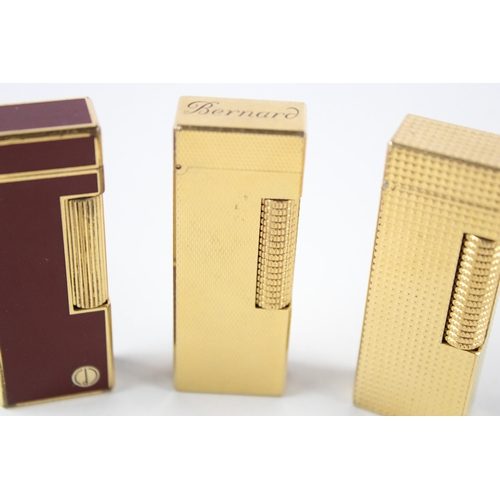 377 - 3 x Dunhill Rollagas Gold Plated Lighters Inc Burgundy Enamel Etc