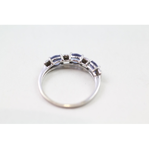 24 - 9ct gold blue tanzanite & white gemstone eternity ring (1.7g) Size  O