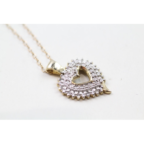 29 - 9ct gold diamond heart shaped pendant & chain (4.1g)