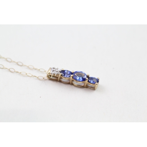 41 - 9ct gold sapphire & diamond drop pendant & chain (1.2g)