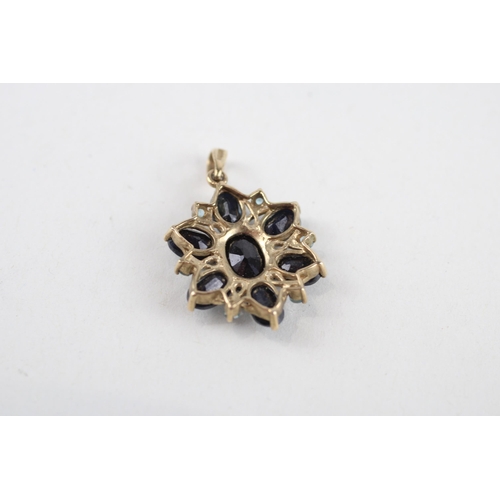 49 - 9ct gold sapphire & blue topaz cluster pendant (3g)