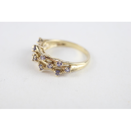 60 - 9ct gold tanzanite ring (3.1g) Size  O 1/2