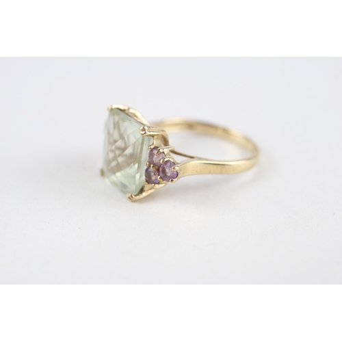 61 - 9ct gold green quartz & amethyst dress ring (4.1g) Size  N 1/2