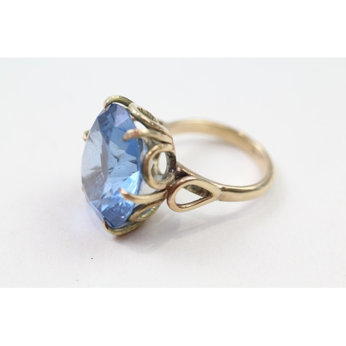 74 - 9ct gold blue gem dress ring (11.1g) Size  P