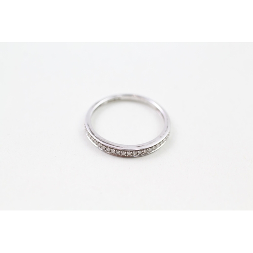 109 - 9ct gold diamond half eternity ring (1.1g) Size  M