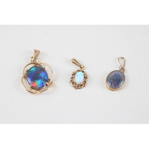 113 - 3x 9ct gold opal & opal triplets pendants (2.4g)