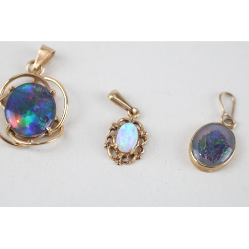 113 - 3x 9ct gold opal & opal triplets pendants (2.4g)