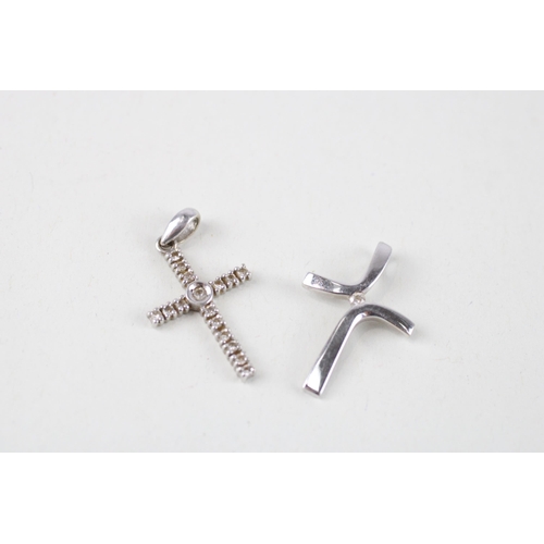 115 - 2x 9ct white gold diamond cross pendants (2.1g)