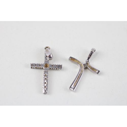 115 - 2x 9ct white gold diamond cross pendants (2.1g)