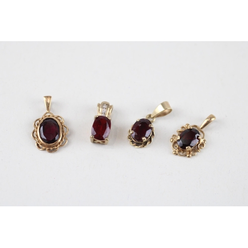 118 - 4x 9ct gold garnet & diamond pendants (3.1g)