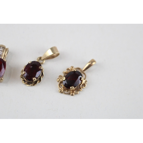 118 - 4x 9ct gold garnet & diamond pendants (3.1g)