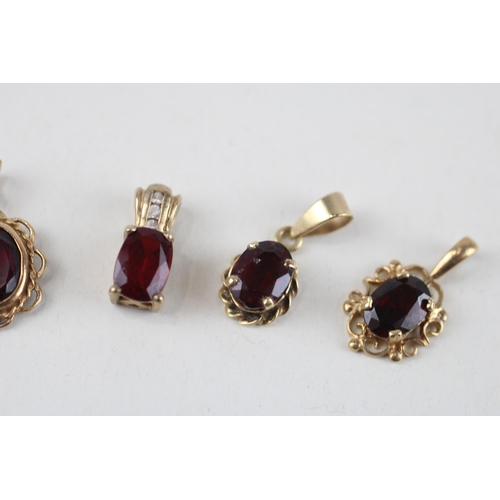 118 - 4x 9ct gold garnet & diamond pendants (3.1g)