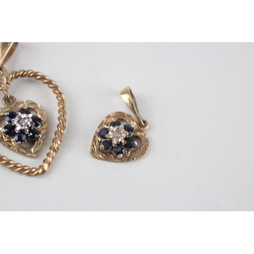 119 - 2x 9ct gold sapphire & diamond pendants (2.8g)