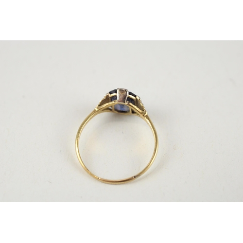 124 - 14ct gold blue gemstone ring (1.6g) Size  M