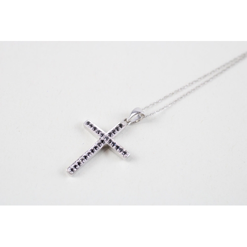 129 - 9ct white gold sapphire cross pendant & chain (2.3g)