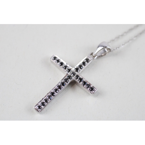 129 - 9ct white gold sapphire cross pendant & chain (2.3g)