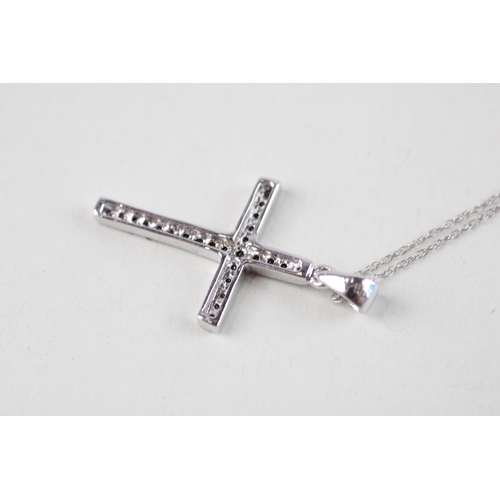 129 - 9ct white gold sapphire cross pendant & chain (2.3g)