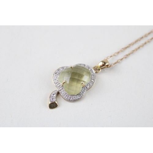 130 - 9ct gold facet gemstone & diamond clover pendant & chain (3g)