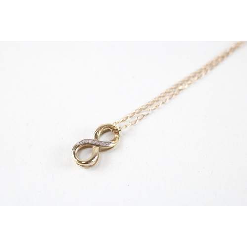 131 - 9ct gold diamond infinity pendant & chain (2.1g)