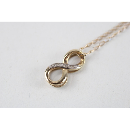 131 - 9ct gold diamond infinity pendant & chain (2.1g)