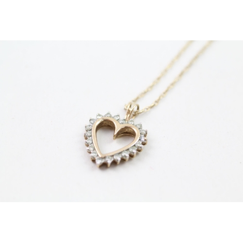 16 - 9ct gold diamond heart shaped pendant & chain (2.2g)