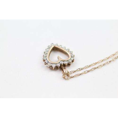 16 - 9ct gold diamond heart shaped pendant & chain (2.2g)