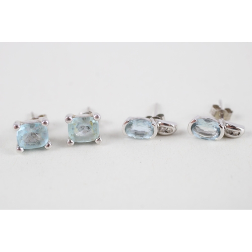 23 - 2x 9ct white gold blue gemstone & diamond stud earrings (4.2g)