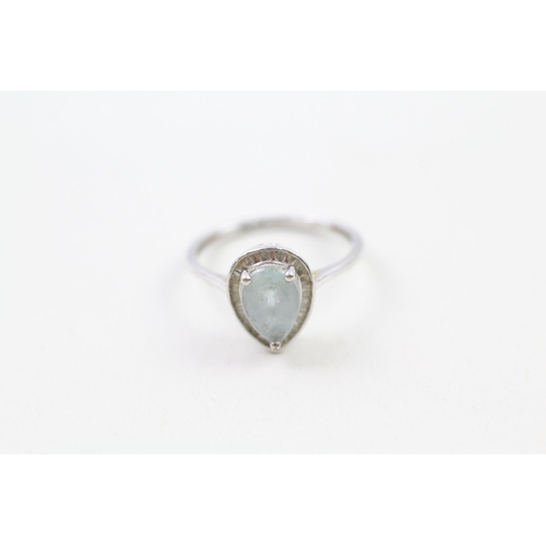 34 - 9ct gold blue gemstone & diamond dress ring (2g) Size  N