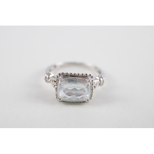 48 - 9ct white gold blue gemstone dress ring (3.3g) Size  N 1/2