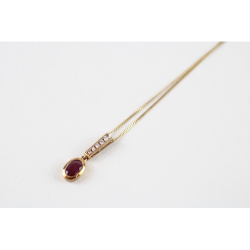 61 - 9ct gold ruby & diamond pendant & chain (1.6g)