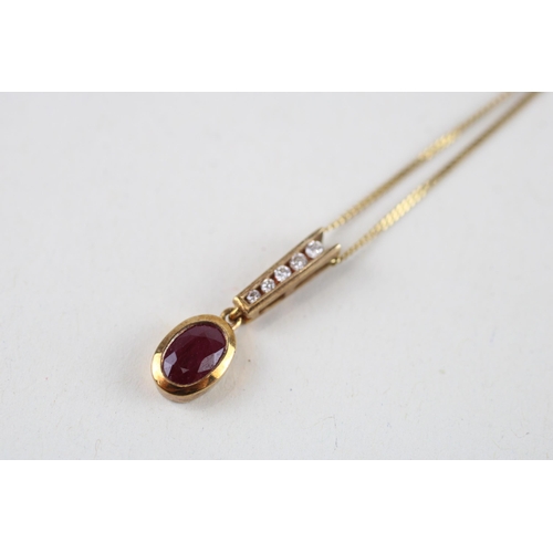 61 - 9ct gold ruby & diamond pendant & chain (1.6g)