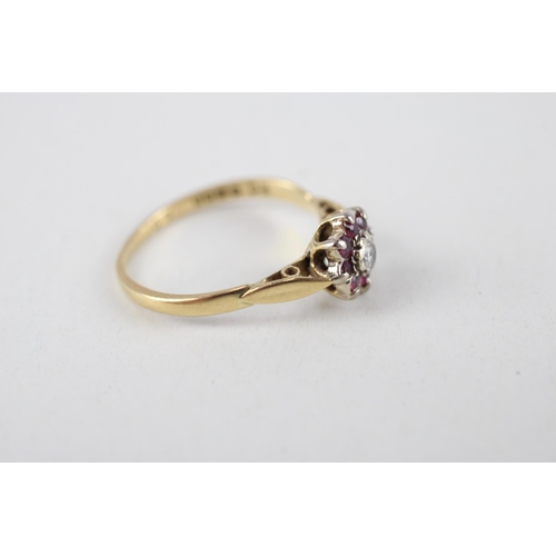 72 - 18ct gold ruby & diamond cluster ring (2.1g) Size  N