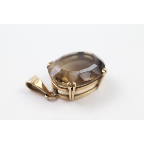 78 - 9ct gold smokey quartz pendant, hallmarked in Edinburgh 1966 (9.1g)