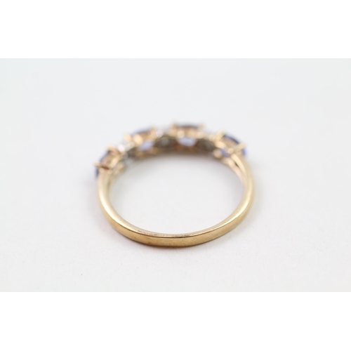 92 - 9ct gold tanzanite & diamond half eternity ring (1.8g) Size  P 1/2