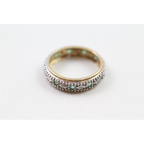 93 - 9ct gold emerald & diamond full eternity ring (2.6g) Size  N