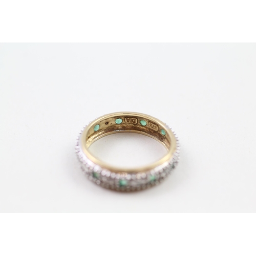 93 - 9ct gold emerald & diamond full eternity ring (2.6g) Size  N