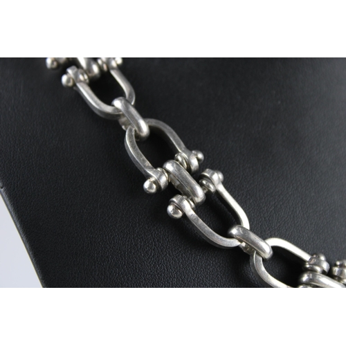 154 - Silver snaffle link necklace (102g)  46cm total length.