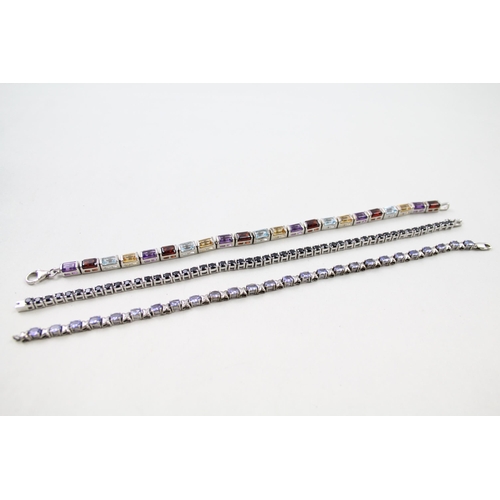 157 - Three silver gemstone tennis bracelets including Garnet (31g)