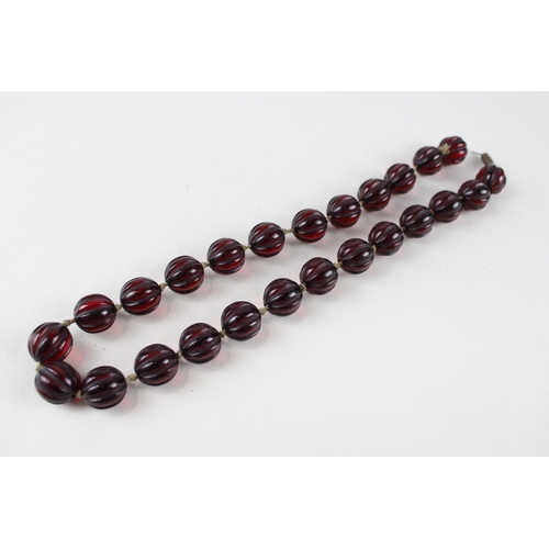 Cherry Bakelite individually knotted necklace for restringing (46g)