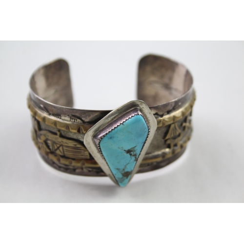 162 - Silver Navajo story telling bangle signed by Nellie Ramone (69g)