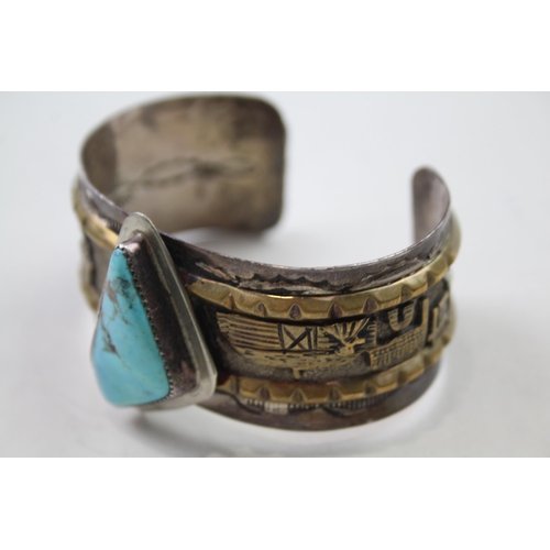 162 - Silver Navajo story telling bangle signed by Nellie Ramone (69g)