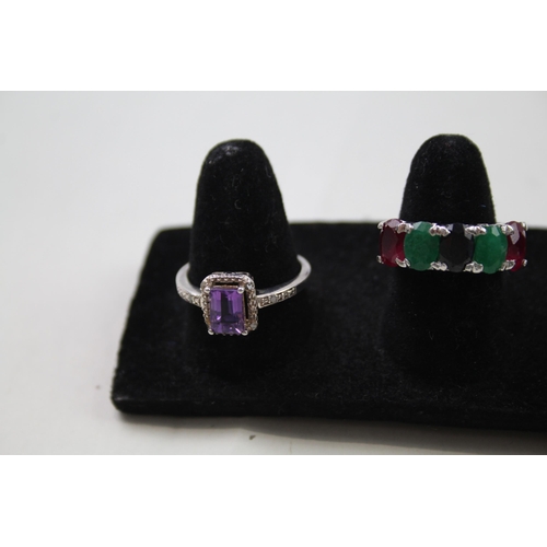 179 - A collection of silver gemstone rings including Amethyst (23g)