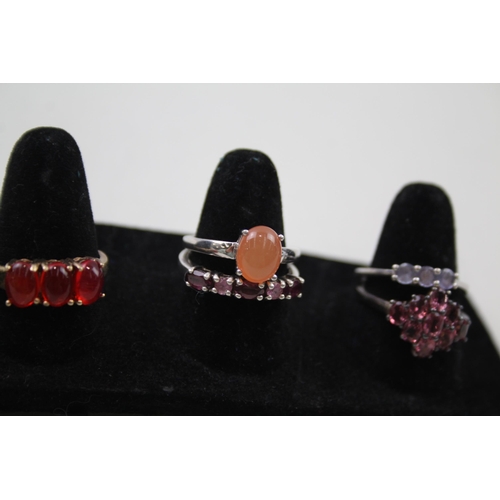 179 - A collection of silver gemstone rings including Amethyst (23g)