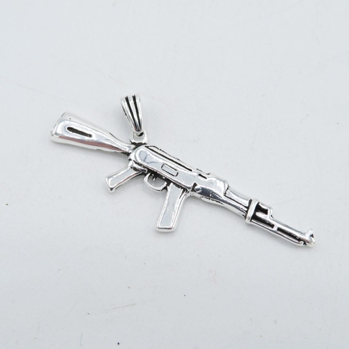 203 - HM Sterling Silver 925 AK47 pendant with bail in excellent condition (12.3g) - measures 66mm long