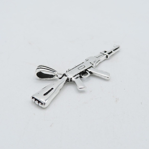 203 - HM Sterling Silver 925 AK47 pendant with bail in excellent condition (12.3g) - measures 66mm long