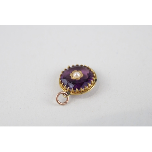 127 - 9ct gold amethyst & seed pearl daisy pendant (1.1g)