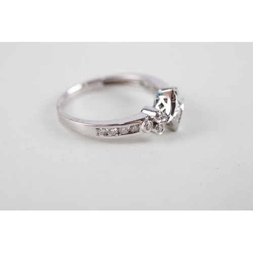 133 - 9ct white gold diamond dress ring (3.1g) Size  P